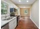 Updated kitchen boasts stainless steel appliances and hardwood floors at 1847 Ridgeland Dr, Decatur, GA 30032