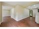Hardwood floors and neutral walls in the hallway at 1847 Ridgeland Dr, Decatur, GA 30032