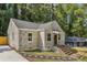 Charming brick house with steps and a spacious yard at 1847 Ridgeland Dr, Decatur, GA 30032