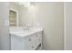 Updated bathroom with white vanity and quartz countertop at 1847 Ridgeland Dr, Decatur, GA 30032