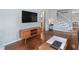 Living room with hardwood floors and a mid-century modern vibe at 873 Hearthstone Dr, Stone Mountain, GA 30083