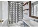 Bathroom with a tub, shower, and updated vanity at 873 Hearthstone Dr, Stone Mountain, GA 30083