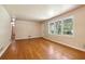 Bright living room with hardwood floors and access to other rooms at 1272 Breezy Ne Ln, Atlanta, GA 30329