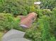 Aerial view of house with brown roof and green lawn at 1272 Breezy Ne Ln, Atlanta, GA 30329