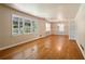 Spacious living room featuring hardwood floors and large windows at 1272 Breezy Ne Ln, Atlanta, GA 30329