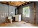 Unfinished basement with toilet and washer at 1272 Breezy Ne Ln, Atlanta, GA 30329