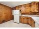 Kitchen with wood cabinets, appliances, and tile floor at 1272 Breezy Ne Ln, Atlanta, GA 30329