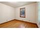 Bright bedroom with hardwood floors and a window at 1272 Breezy Ne Ln, Atlanta, GA 30329