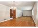 Spacious dining room with hardwood floors and kitchen access at 1272 Breezy Ne Ln, Atlanta, GA 30329
