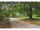 Brick ranch house with a front porch and large yard at 1272 Breezy Ne Ln, Atlanta, GA 30329