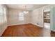 Empty dining room with hardwood floors and a chandelier at 1272 Breezy Ne Ln, Atlanta, GA 30329