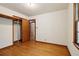 Bedroom with hardwood floors and a closet at 1272 Breezy Ne Ln, Atlanta, GA 30329