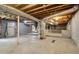 Unfinished basement with HVAC and stairs at 1272 Breezy Ne Ln, Atlanta, GA 30329