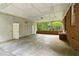 Covered back porch with brick and wood at 1272 Breezy Ne Ln, Atlanta, GA 30329