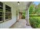 Covered front porch with brick columns at 1272 Breezy Ne Ln, Atlanta, GA 30329
