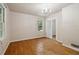 Charming bedroom with hardwood floors and a large window at 1272 Breezy Ne Ln, Atlanta, GA 30329