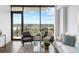 Modern living room featuring floor-to-ceiling windows and balcony access at 788 W Marietta Nw St # 413, Atlanta, GA 30318