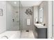 Modern bathroom with a glass shower and floating vanity at 45 Ivan Allen Jr. Nw Blvd # 2501, Atlanta, GA 30308