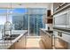 Modern kitchen with granite countertops and stainless steel appliances at 45 Ivan Allen Jr. Nw Blvd # 2501, Atlanta, GA 30308