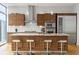 Modern kitchen with large island and stainless steel appliances at 45 Ivan Allen Jr. Nw Blvd # 2501, Atlanta, GA 30308
