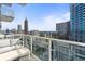 Private balcony with city views and outdoor seating at 45 Ivan Allen Jr. Nw Blvd # 2501, Atlanta, GA 30308