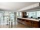 Modern bar with white countertop and stools at 45 Ivan Allen Jr. Nw Blvd # 2501, Atlanta, GA 30308