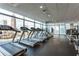Modern fitness center with a variety of cardio and strength training equipment at 45 Ivan Allen Jr. Nw Blvd # 2501, Atlanta, GA 30308