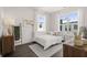 Bright bedroom with a comfortable bed and plenty of natural light at 201 New St # 2106 -109, Decatur, GA 30030