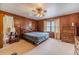 Bright main bedroom with ceiling fan and ample closet space at 1645 Highpoint Rd, Snellville, GA 30078