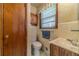 Clean bathroom with single sink vanity and shower at 1645 Highpoint Rd, Snellville, GA 30078