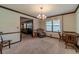 Bright dining room with a chandelier and views to the living room at 1645 Highpoint Rd, Snellville, GA 30078