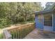 Wooden deck overlooking a wooded backyard at 1645 Highpoint Rd, Snellville, GA 30078