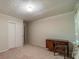 Bedroom with carpeted floor and built-in dresser at 1645 Highpoint Rd, Snellville, GA 30078