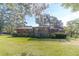 Brick house exterior with large backyard at 1645 Highpoint Rd, Snellville, GA 30078