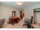 Simple bedroom with carpeted floor, dresser, and chair at 1645 Highpoint Rd, Snellville, GA 30078