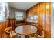 Kitchen nook with wood cabinets and built-in desk at 1645 Highpoint Rd, Snellville, GA 30078