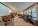Spacious living room features a fireplace and ample seating at 1645 Highpoint Rd, Snellville, GA 30078