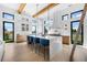 Gourmet kitchen boasts expansive island, high-end appliances, and ample cabinetry at 8200 Main S St # 1306, Woodstock, GA 30188
