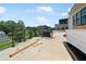 Spacious rooftop deck with city views and modern railing at 8200 Main S St # 1306, Woodstock, GA 30188