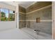 Bathroom with large window and framed shower walls at 8200 Main S St # 1306, Woodstock, GA 30188