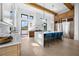 Modern kitchen with island, wood cabinetry, and stainless steel appliances at 8200 Main S St # 1306, Woodstock, GA 30188