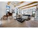 Open living room with hardwood floors and grand piano at 8200 Main S St # 1306, Woodstock, GA 30188
