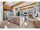 Modern kitchen features a large island, stainless steel appliances, and wood cabinetry at 8200 Main S St # 1306, Woodstock, GA 30188