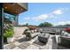 Relaxing rooftop patio features a fire pit and ample seating for entertaining at 8200 Main S St # 1306, Woodstock, GA 30188