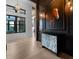 Bright entryway with marble cabinet and large artwork at 8200 Main S St # 1306, Woodstock, GA 30188