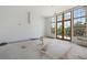 Kitchen area with large windows and an unfinished interior at 8200 Main S St # 1306, Woodstock, GA 30188