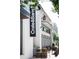 Exterior view of Crate & Barrel store with outdoor seating at 2270 Park Walke Dr, Alpharetta, GA 30009