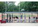 Youth baseball team sits in dugout during game at 2310 Park Walke Dr, Alpharetta, GA 30009