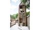 Wooden playground structure with tower and slide at 2300 Park Walke Dr, Alpharetta, GA 30009
