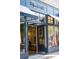 Exterior of a Madewell store with large windows and awnings at 2300 Park Walke Dr, Alpharetta, GA 30009